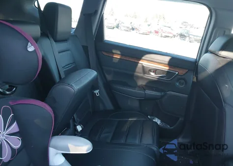 2021 Honda Cr-V Awd Touring z USA, uszkodzony, nr VIN 2HKRW2H90MH627360